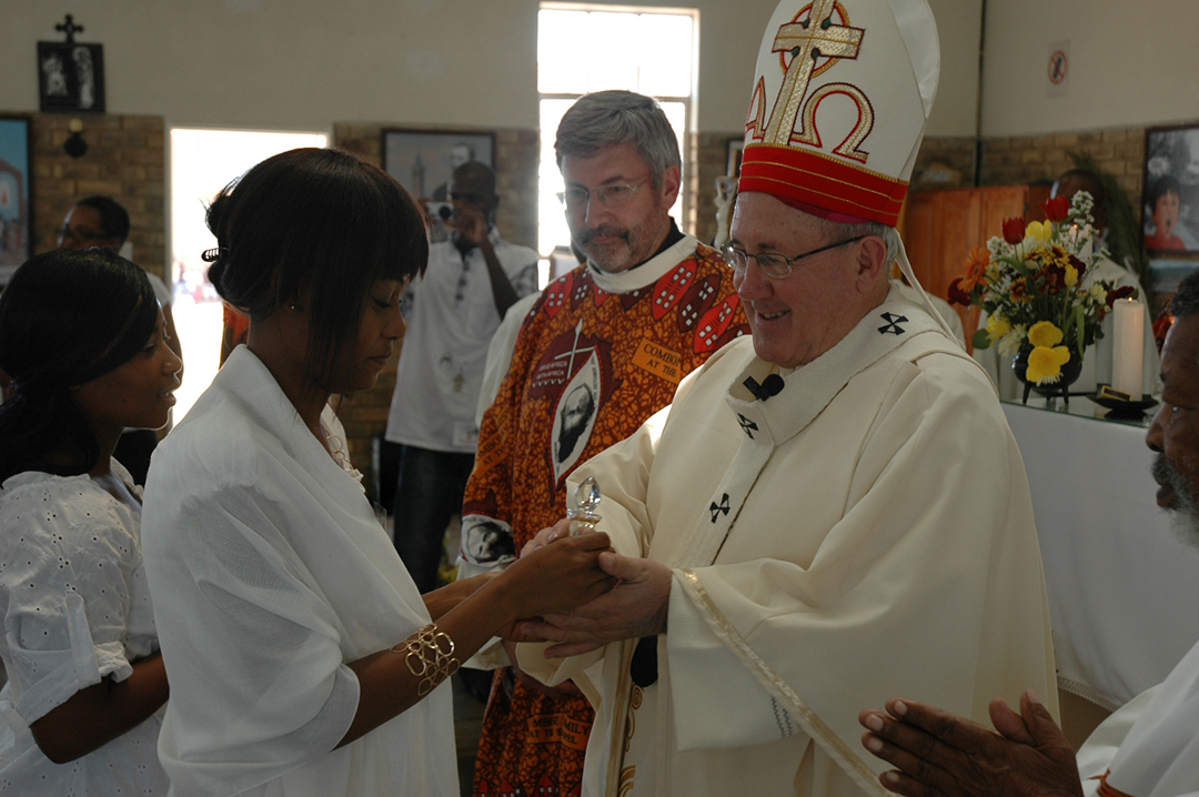 Archbishop William Slattery, Fr James Calvera MCCJ and parishioners, during the celebration of Confirmations at Saint Daniel Comboni, in September 2015, five years after the establishment of the parish. Credit: Jame Calvera MCCJ.